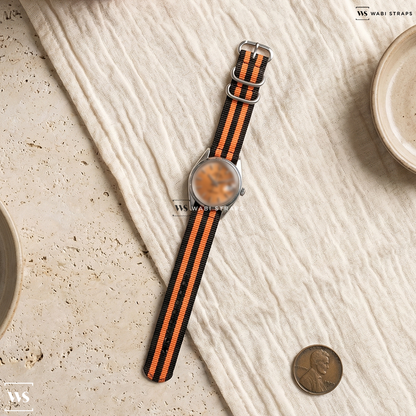 Black/Orange 5 Stripes Nylon Watch Strap on Universal Geneve Polerouter Date Microrotor Patina Tropical Dial