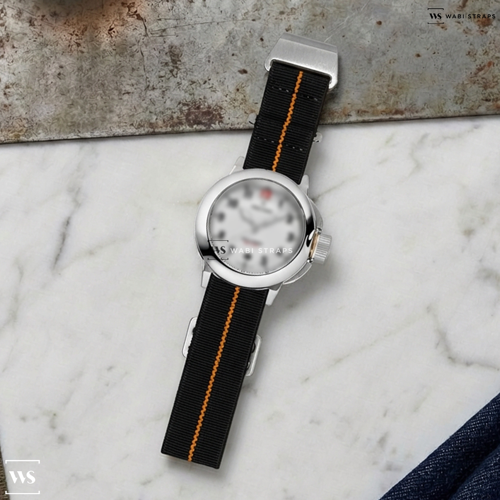 Black/Orange 3-Stripe Nylon Watch Strap on Waltham Field & Marine “Red 12”